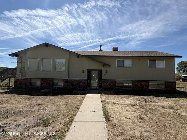 5 Acres of Land with Home for Sale in Aztec, New Mexico