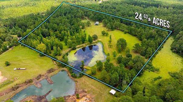 24.6 Acres of Land with Home for Sale in Baker, Florida