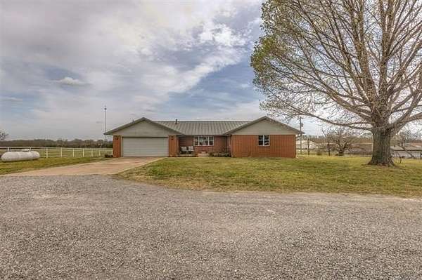 10 Acres of Land with Home for Sale in Chouteau, Oklahoma