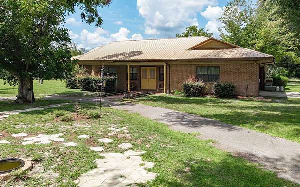 2 Acres of Land with Home for Sale in Live Oak, Florida