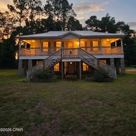 30.3 Acres of Land with Home for Sale in Bascom, Florida