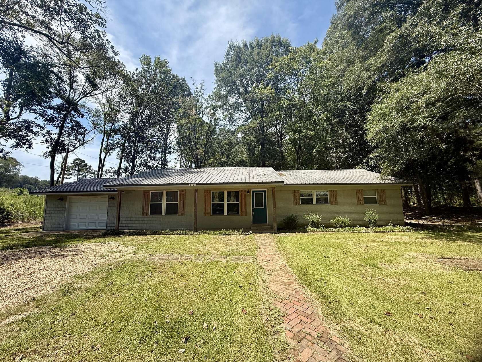 1.5 Acres of Land with Home for Sale in Mantachie, Mississippi