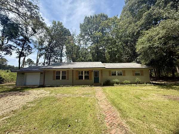 1.5 Acres of Land with Home for Sale in Mantachie, Mississippi