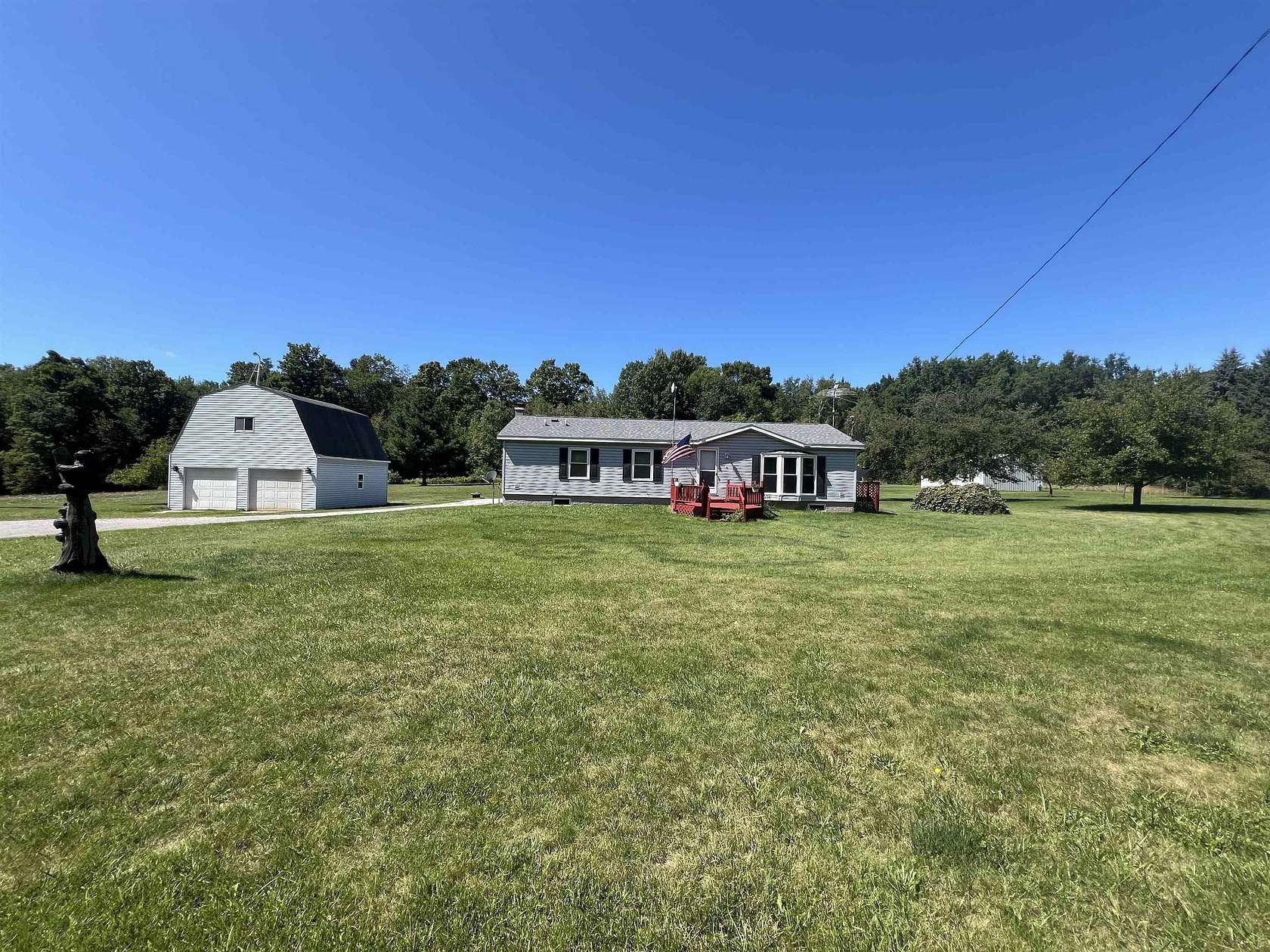 20 Acres of Recreational Land with Home for Sale in Harrison, Michigan