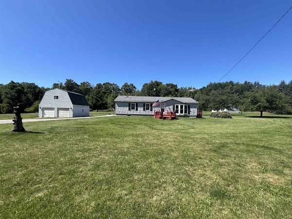 20 Acres of Recreational Land with Home for Sale in Harrison, Michigan