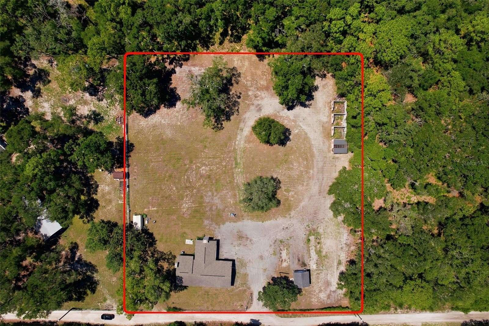2 Acres of Land with Home for Sale in Spring Hill, Florida