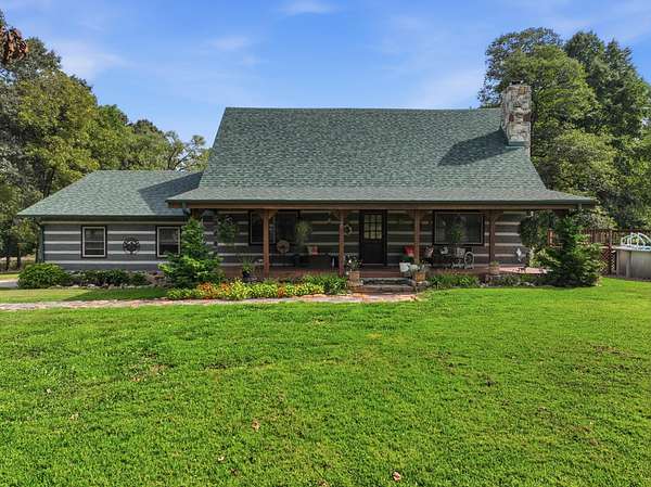 33 Acres of Land with Home for Sale in Caulfield, Missouri