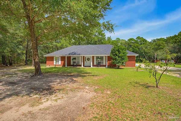 1.5 Acres of Land with Home for Sale in Milton, Florida