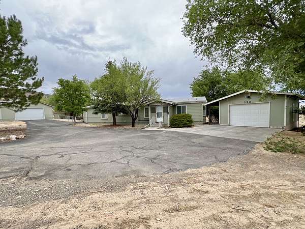 1.64 Acres of Land with Home for Sale in Spring Creek, Nevada