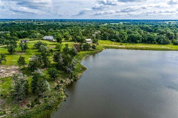 97 Acres of Recreational Land with Home for Sale in Giddings, Texas