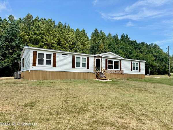 2 Acres of Land with Home for Sale in Summit, Mississippi