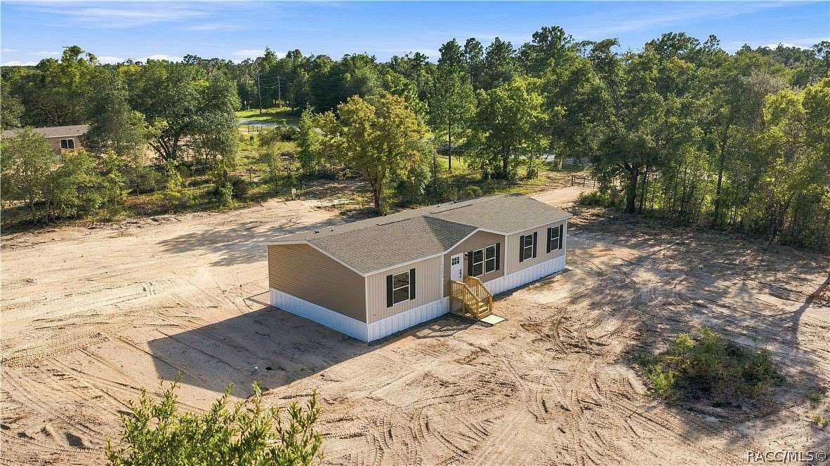 2 Acres of Land with Home for Sale in Bronson, Florida