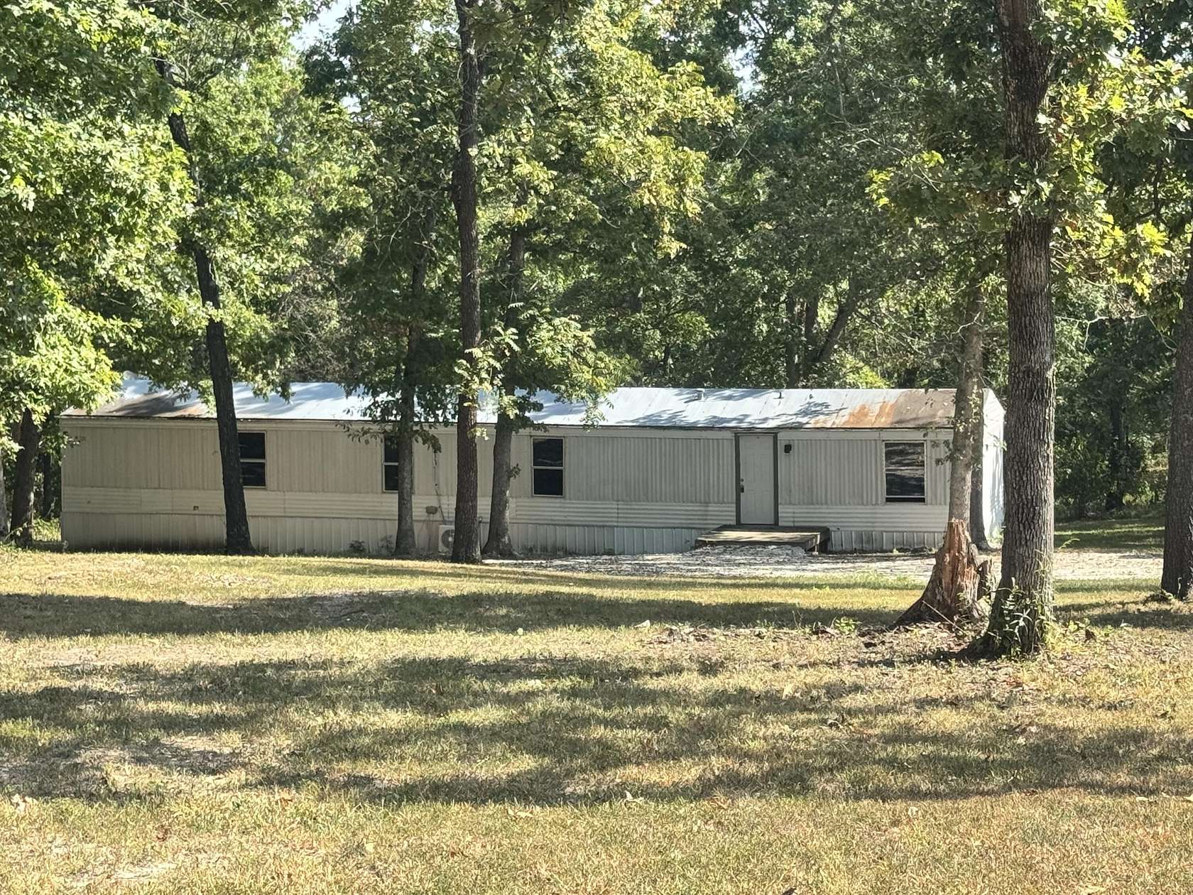 5.42 Acres of Land with Home for Sale in Tunas, Missouri