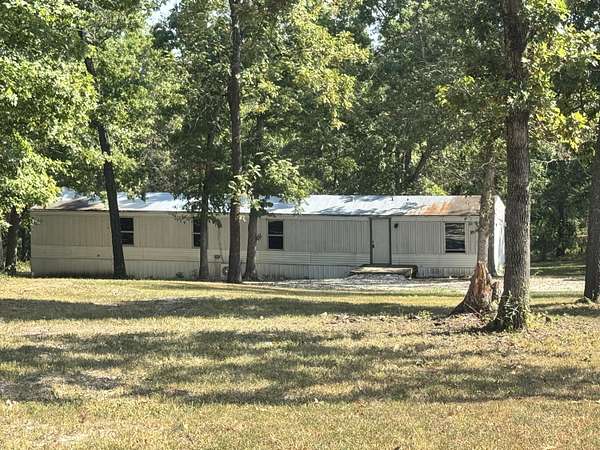5.42 Acres of Land with Home for Sale in Tunas, Missouri