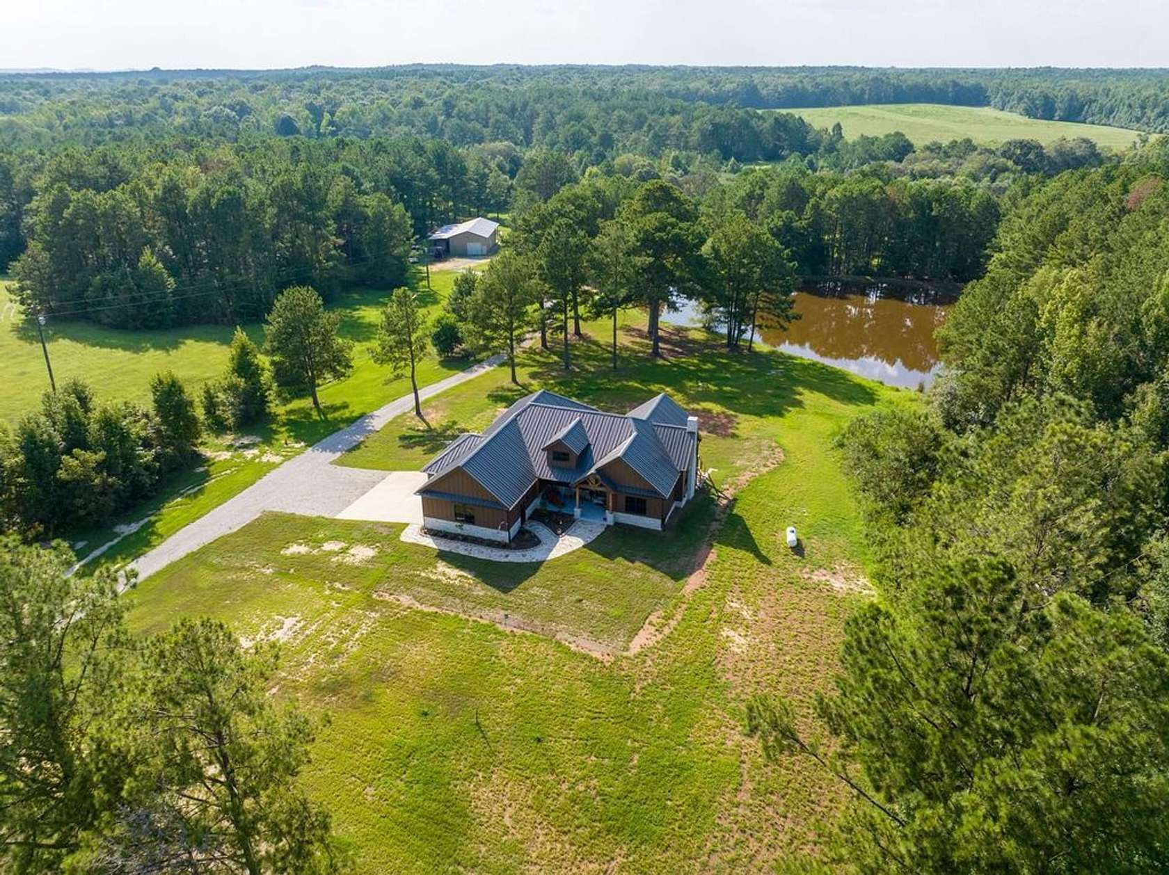 80 Acres of Land with Home for Sale in Troy, Alabama