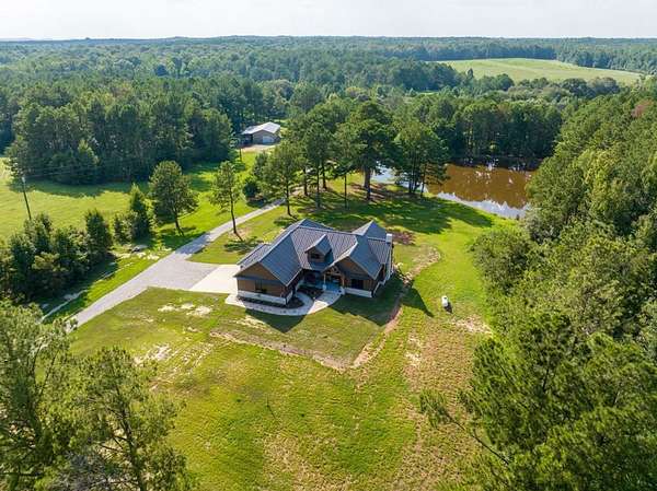 80 Acres of Land with Home for Sale in Troy, Alabama