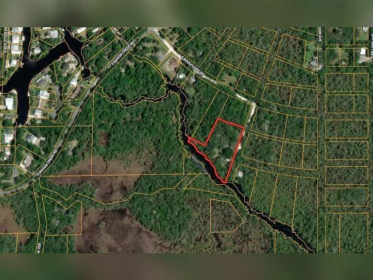 1.86 Acres of Land with Home for Auction in Homosassa, Florida