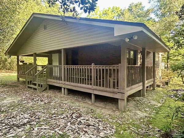 1.52 Acres of Land with Home for Sale in Milton, Florida