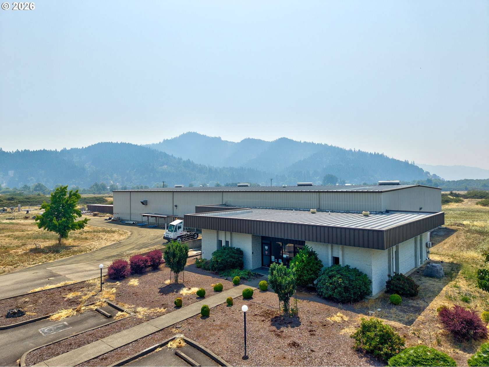 11.2 Acres of Improved Commercial Land for Sale in Sutherlin, Oregon