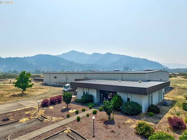 11.2 Acres of Improved Commercial Land for Sale in Sutherlin, Oregon