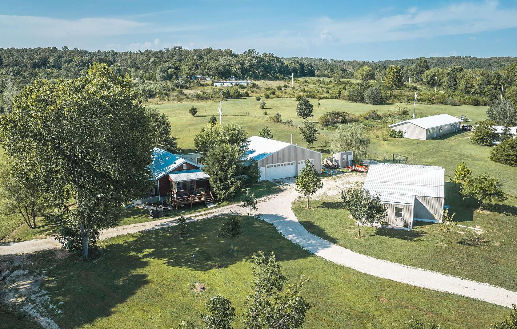 12 Acres of Recreational Land with Home for Sale in Brumley, Missouri