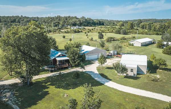 12 Acres of Recreational Land with Home for Sale in Brumley, Missouri