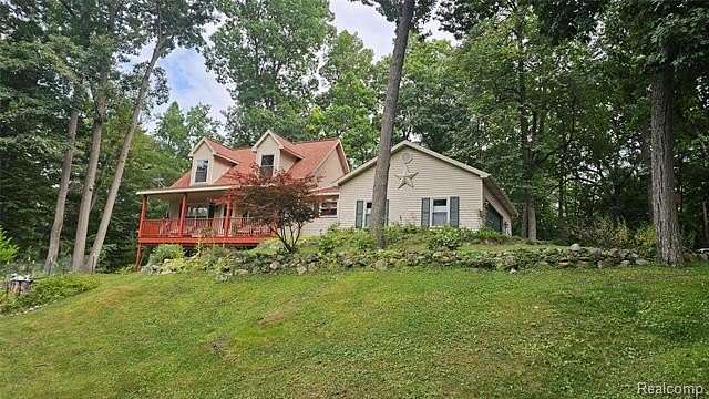 1.8 Acres of Land with Home for Sale in Hamburg Township, Michigan
