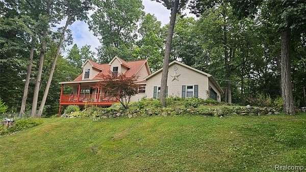 1.8 Acres of Land with Home for Sale in Hamburg Township, Michigan