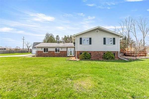 4 Acres of Land with Home for Sale in Lyndon Township, Michigan