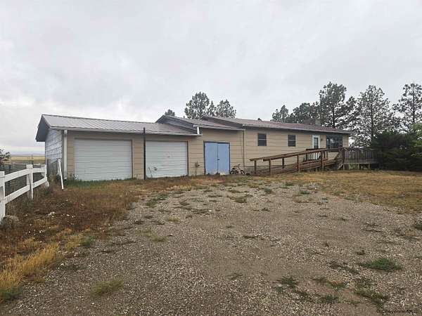 2 Acres of Land with Home for Sale in Wheatland, Wyoming