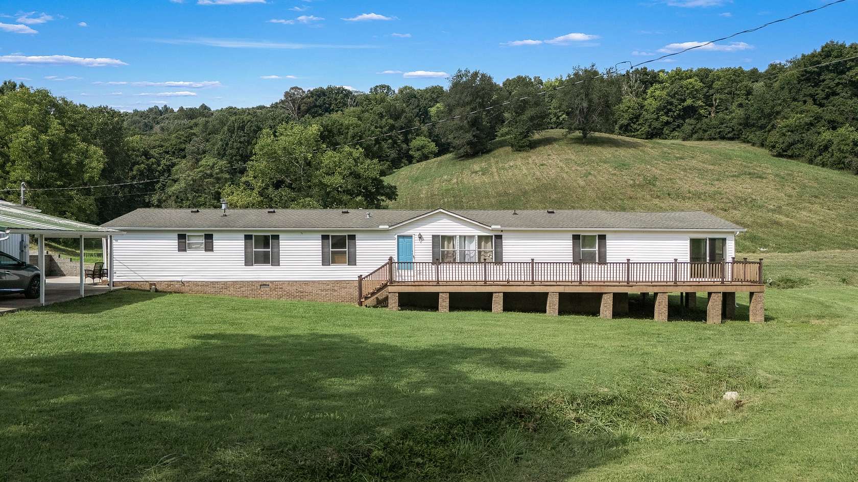 1.87 Acres of Land with Home for Auction in Woodbury, Tennessee
