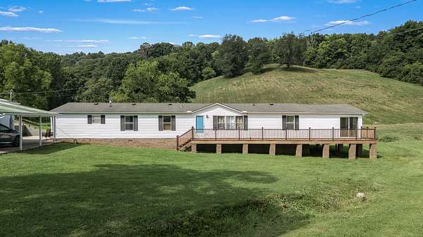 1.87 Acres of Land with Home for Auction in Woodbury, Tennessee