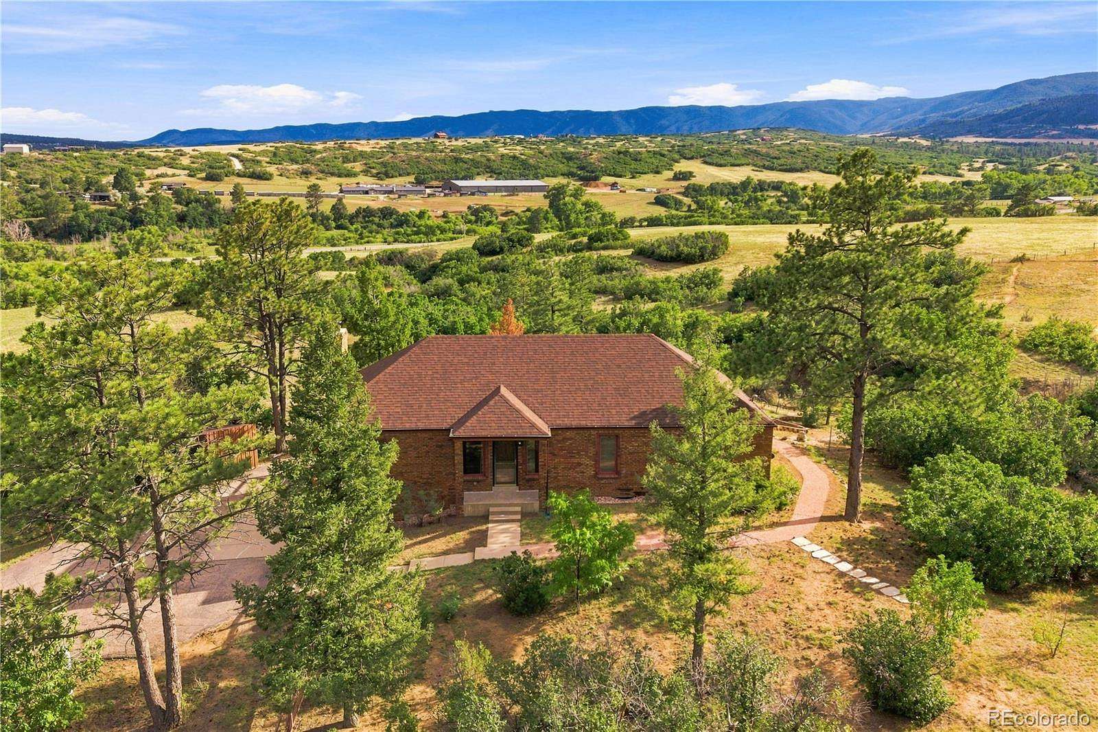 5 Acres of Land with Home for Sale in Sedalia, Colorado