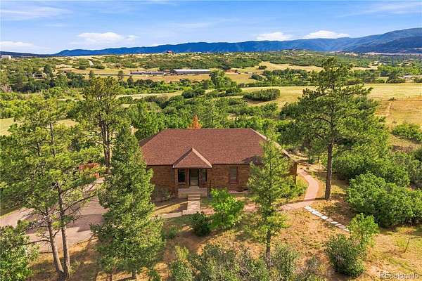 5 Acres of Land with Home for Sale in Sedalia, Colorado