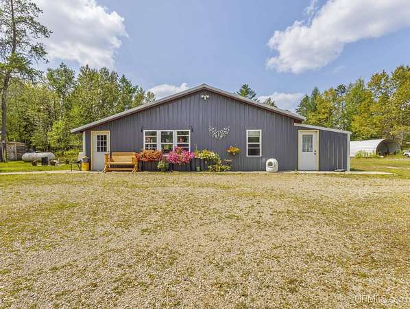 5 Acres of Land with Home for Sale in Daggett, Michigan