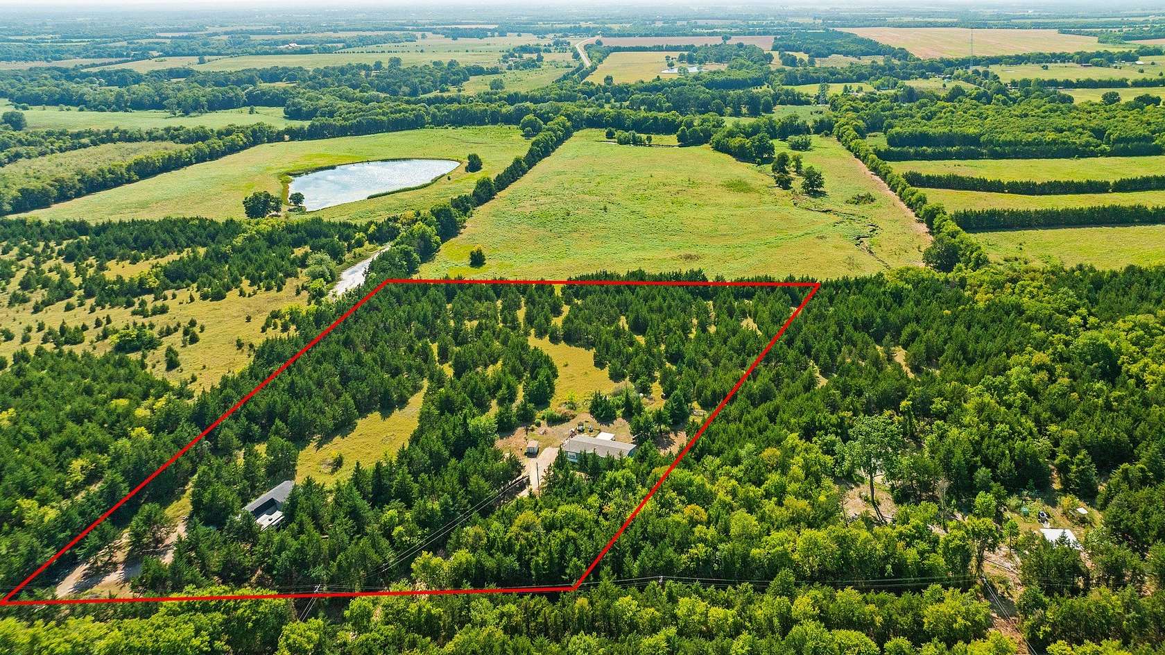 10 Acres of Recreational Land with Home for Sale in Paris, Texas