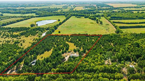 10 Acres of Recreational Land with Home for Sale in Paris, Texas