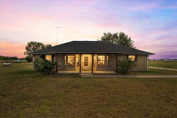2.48 Acres of Land with Home for Sale in Commerce, Texas