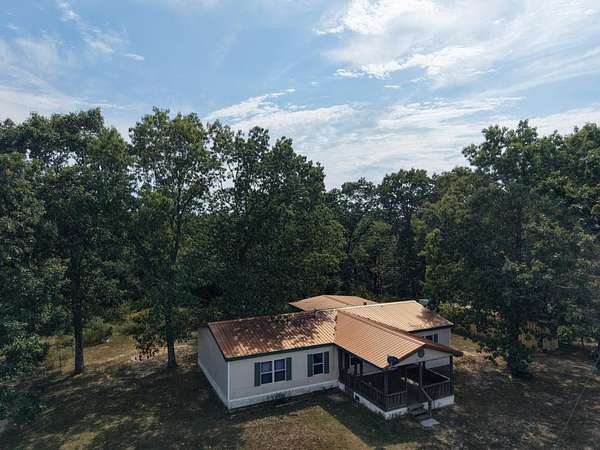 43 Acres of Land with Home for Sale in Hartshorn, Missouri