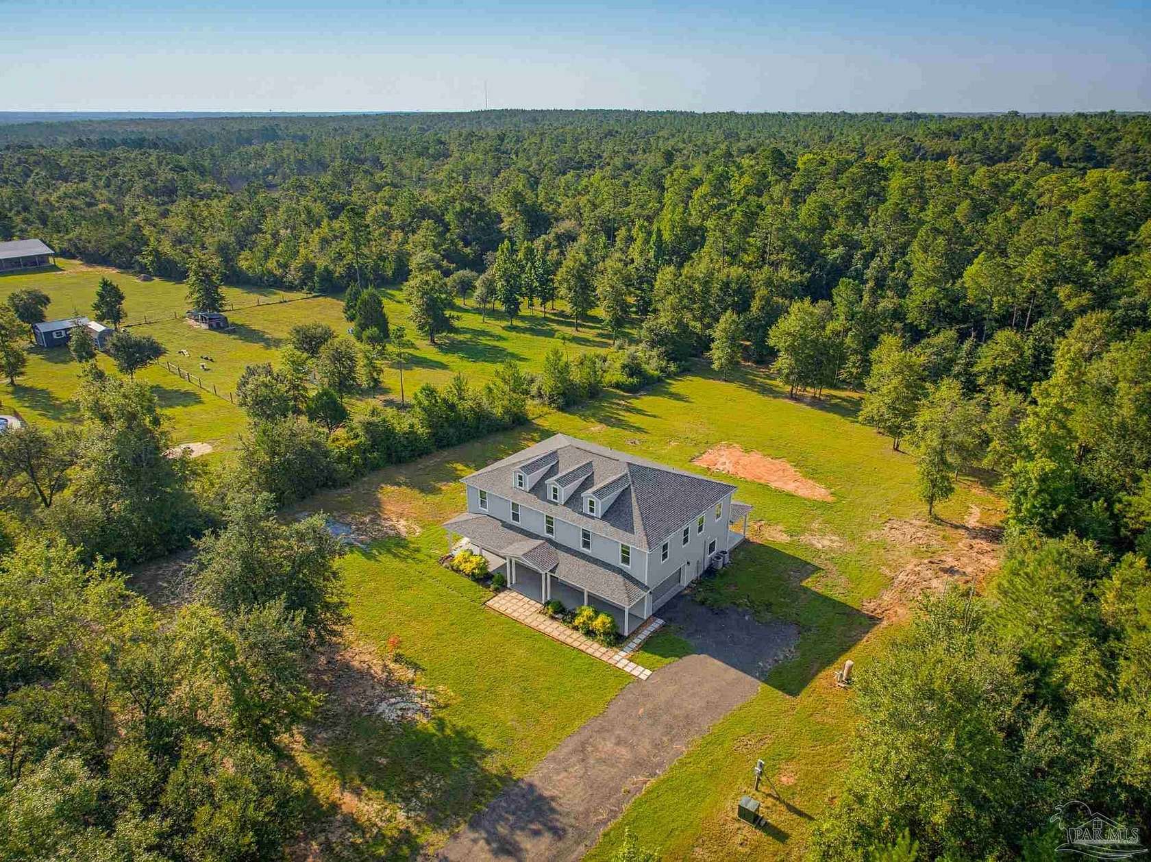 3.42 Acres of Land with Home for Sale in Pace, Florida