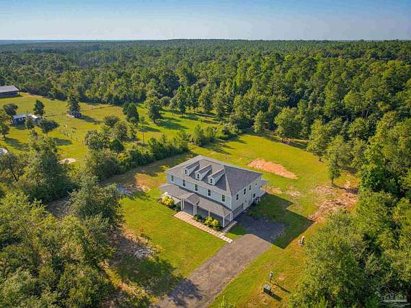 3.42 Acres of Land with Home for Sale in Pace, Florida