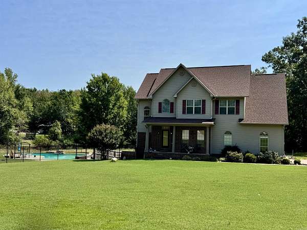 3.56 Acres of Land with Home for Sale in Alexander, Arkansas
