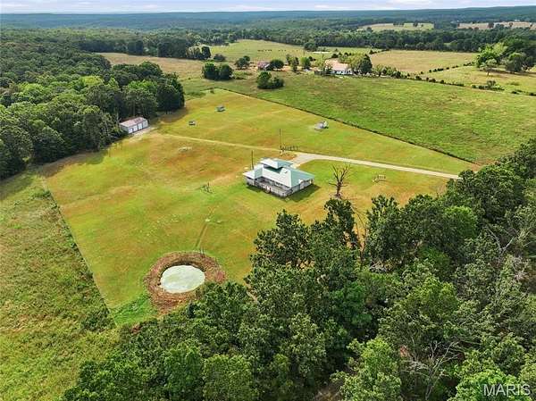 8 Acres of Land with Home for Sale in Roby, Missouri