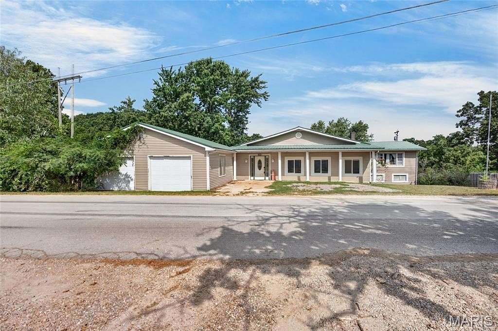 14.6 Acres of Recreational Land with Home for Sale in St. Robert, Missouri