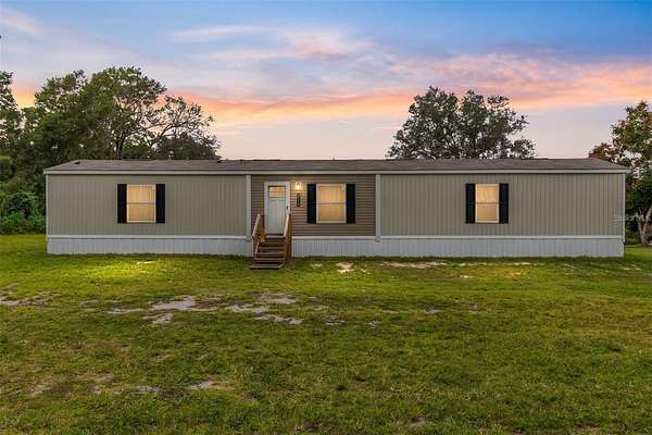 2 Acres of Land with Home for Sale in Fort McCoy, Florida