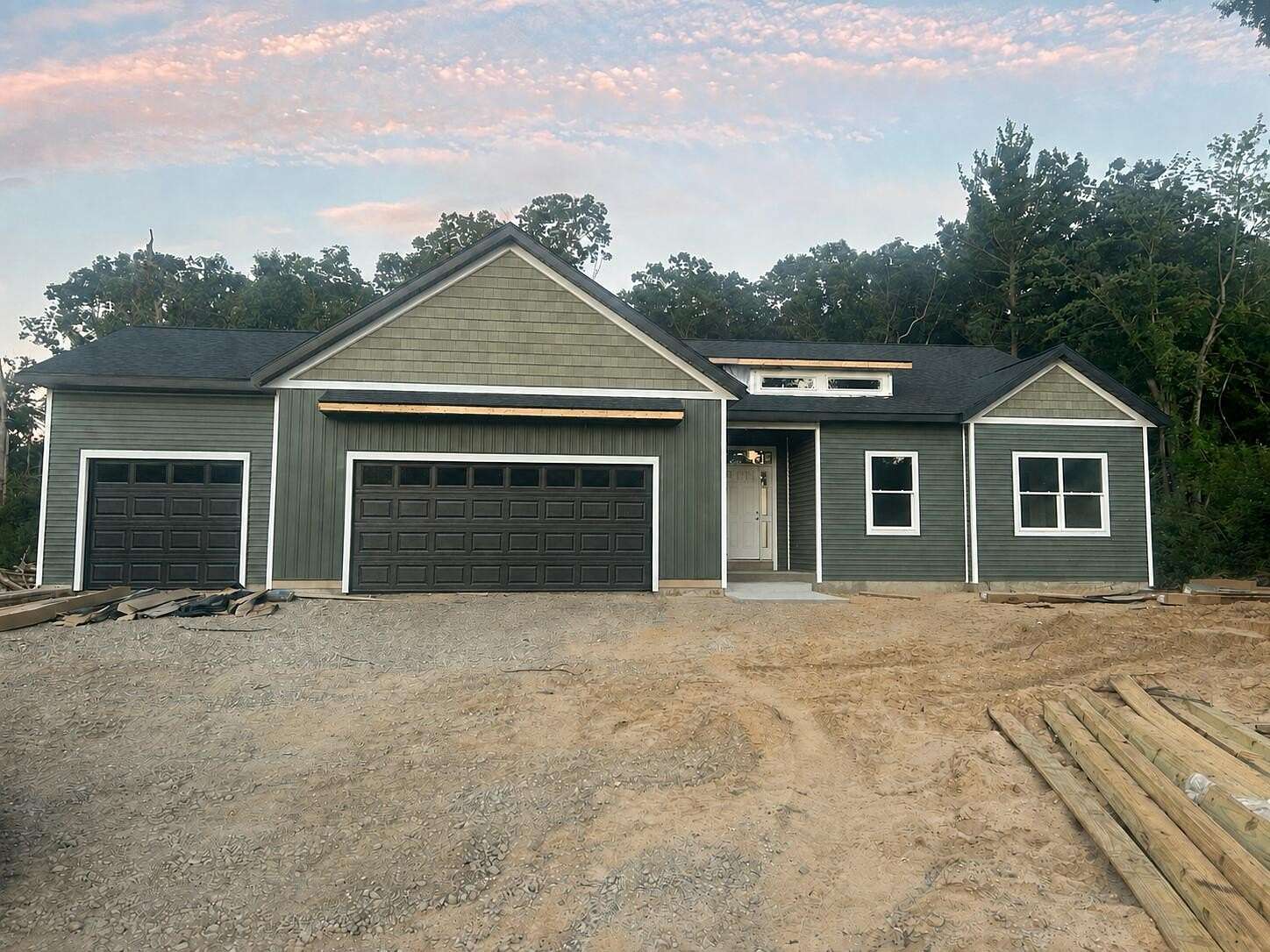 2 Acres of Land with Home for Sale in Comstock Park, Michigan