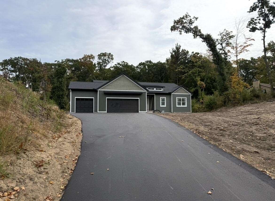 2 Acres of Land with Home for Sale in Comstock Park, Michigan