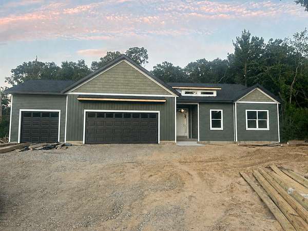2 Acres of Land with Home for Sale in Comstock Park, Michigan