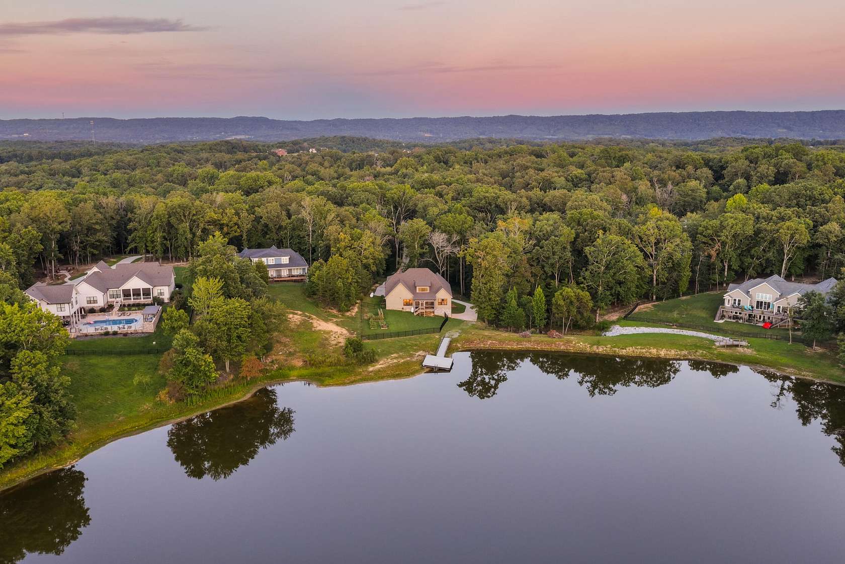 5.6 Acres of Land with Home for Sale in Ooltewah, Tennessee