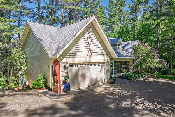 6.87 Acres of Land with Home for Sale in Minocqua, Wisconsin